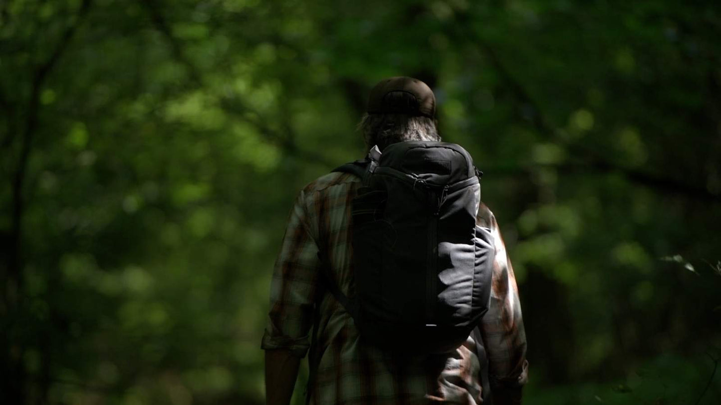 Bug Out and Preparedness Course — Gray Bearded Green Beret Joshua Enyart with Bug Out Bag Entering Forest
