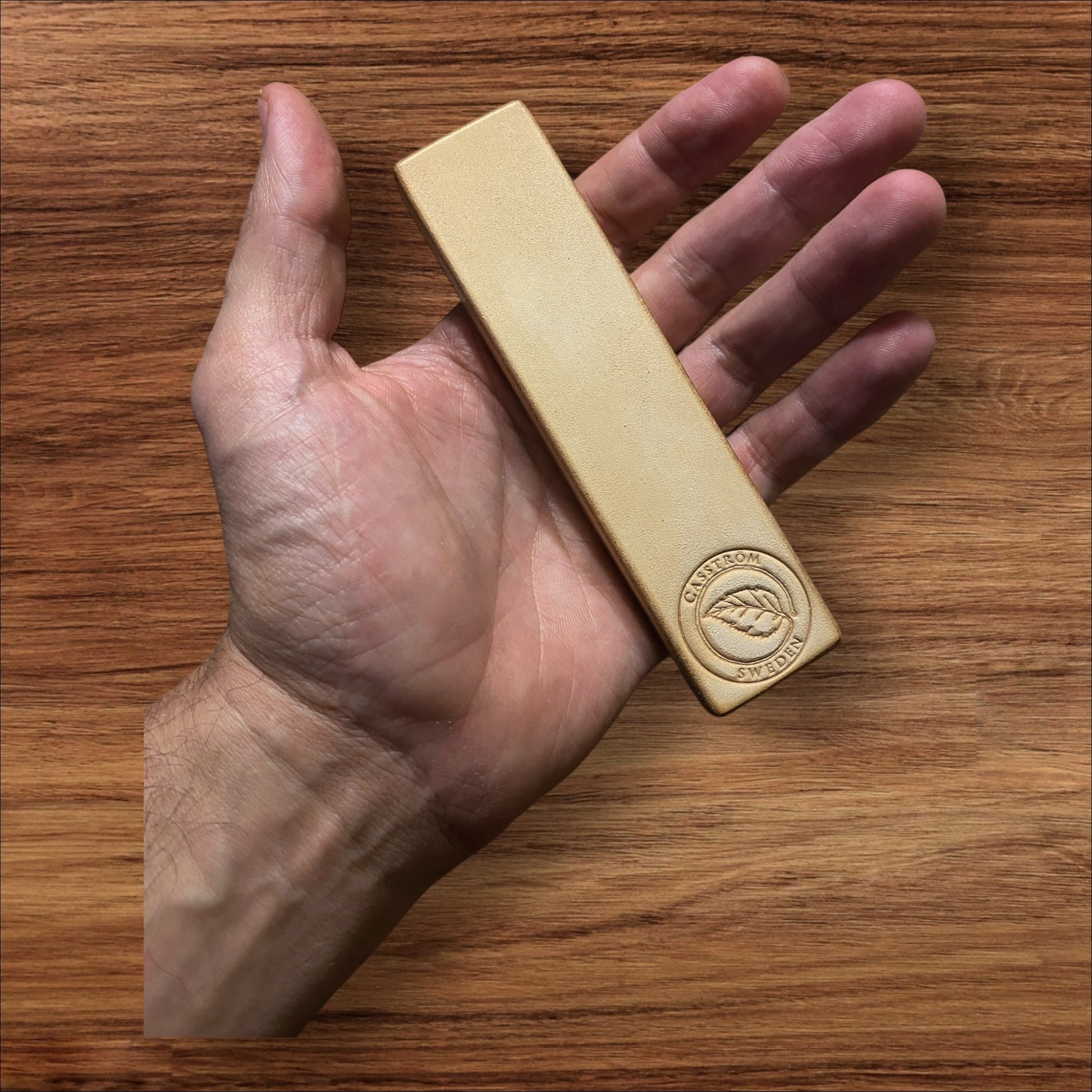 Casstrom Leather Knife Strop: The Ultimate Blade Maintenance Tool in hand smooth side