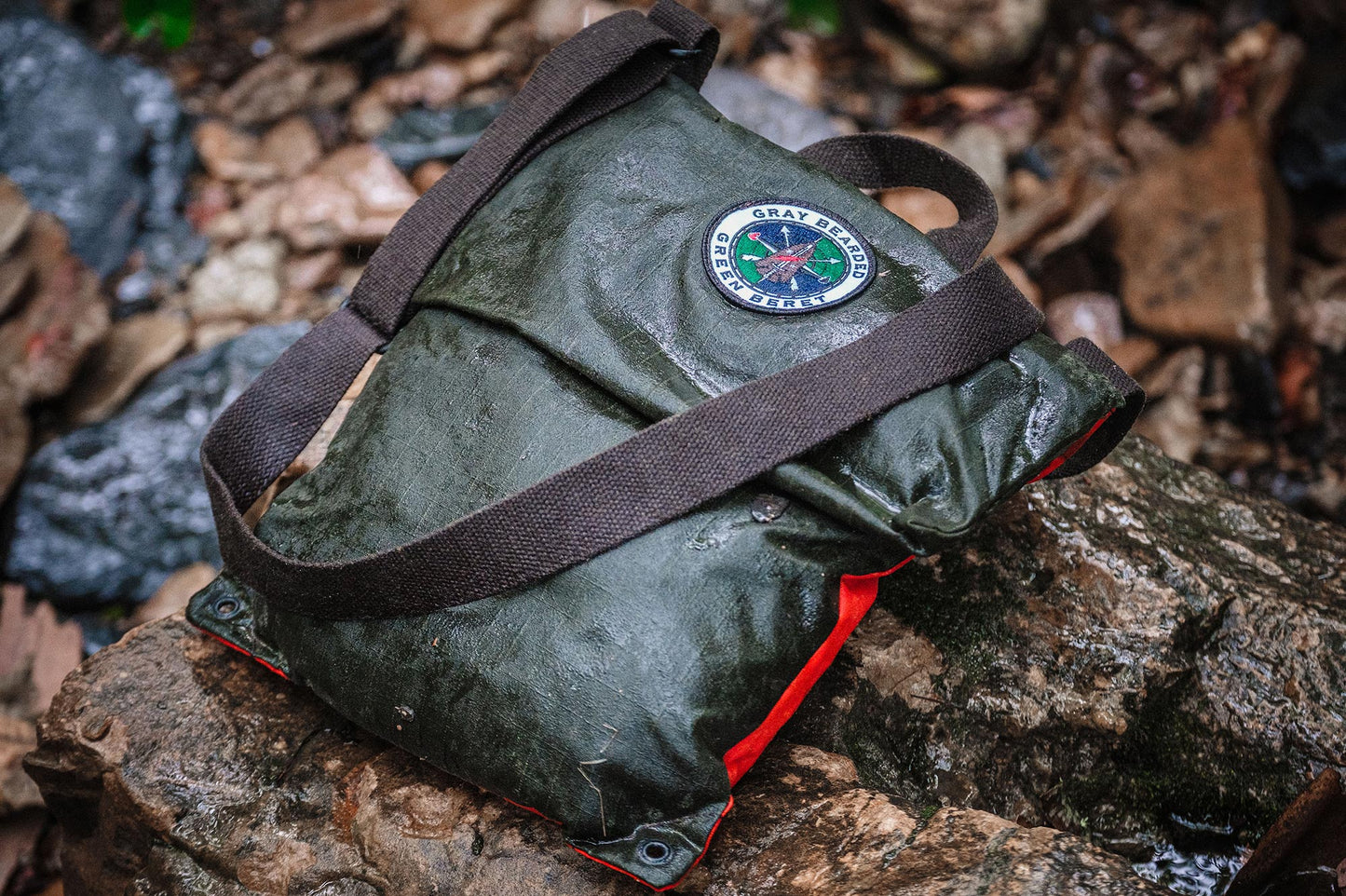 GB2 Waxed Canvas Haversack with Adjustable Strap in rain storm front view