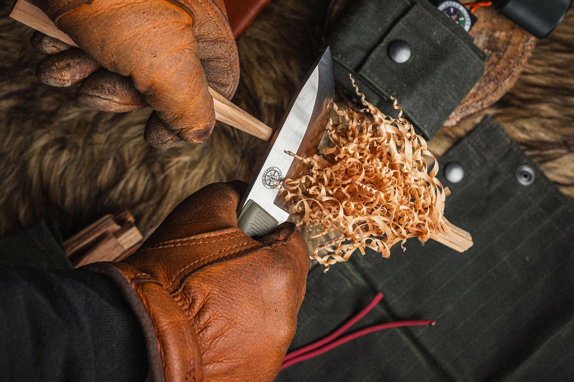 Gray Bearded Green Beret GB2 Jaeger Puukko - Full Tang Hunting and Knife in use featherstick