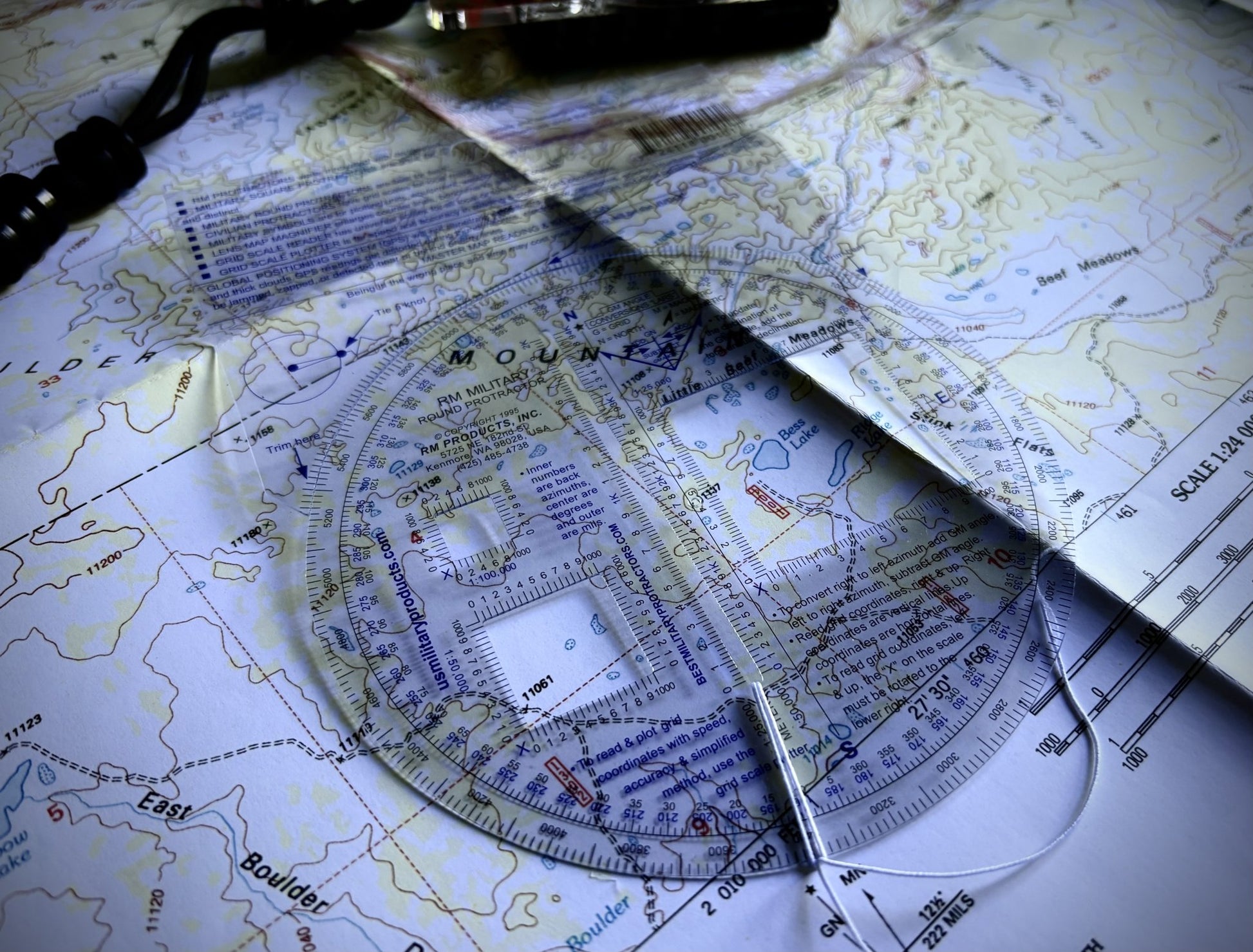 Round Military Protractor Coordinate Scale on Topographic Map