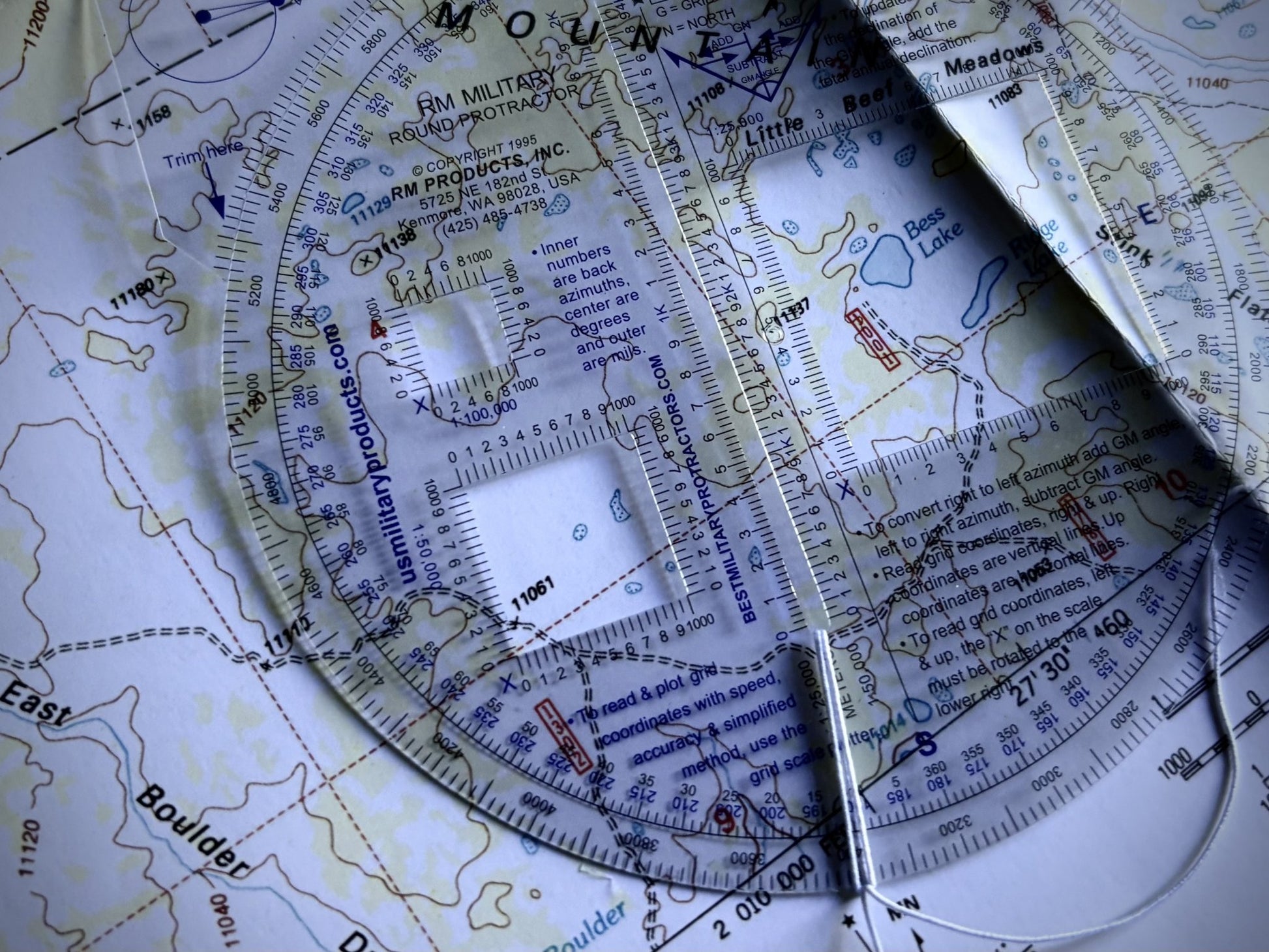 Protractor on a map with visible text and coordinates