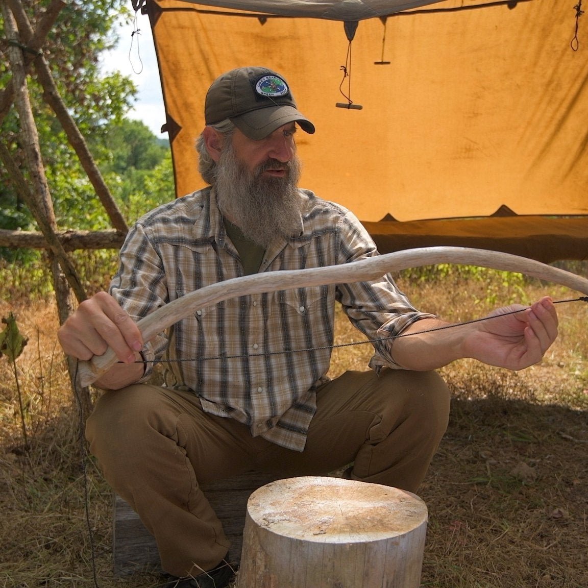 Survival Instructor Training and Certification Program - Gray Bearded Green Beret Survival School Instructor Teaching Bow Drill Friction Fire