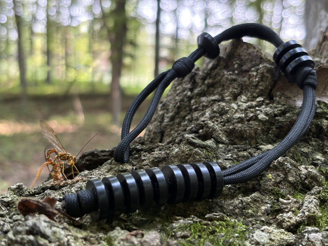 Gray Bearded Green Beret pace beads (Ranger Beads) with nine lower beads and four upper beads on 550 paracord