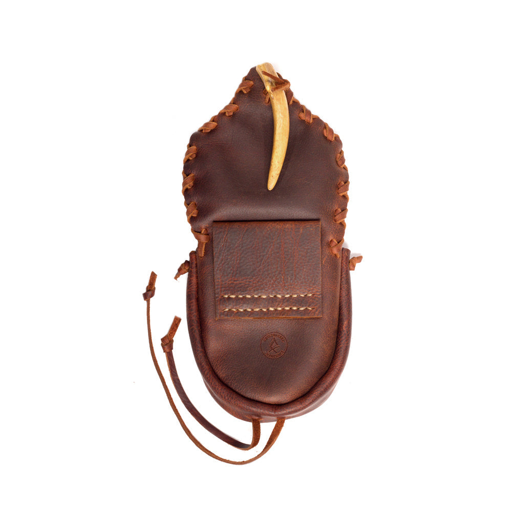 Leather pouch with white background and antler fastener open back view