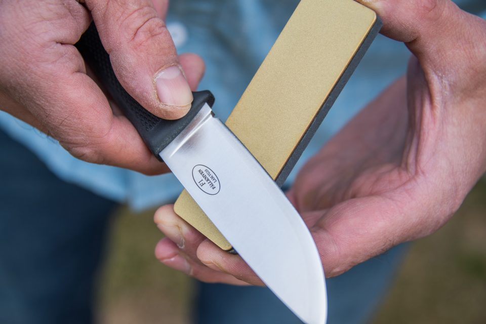 Fjallraven DC4 Field Knife Sharpening Stone: The Ultimate Field Sharpener in use