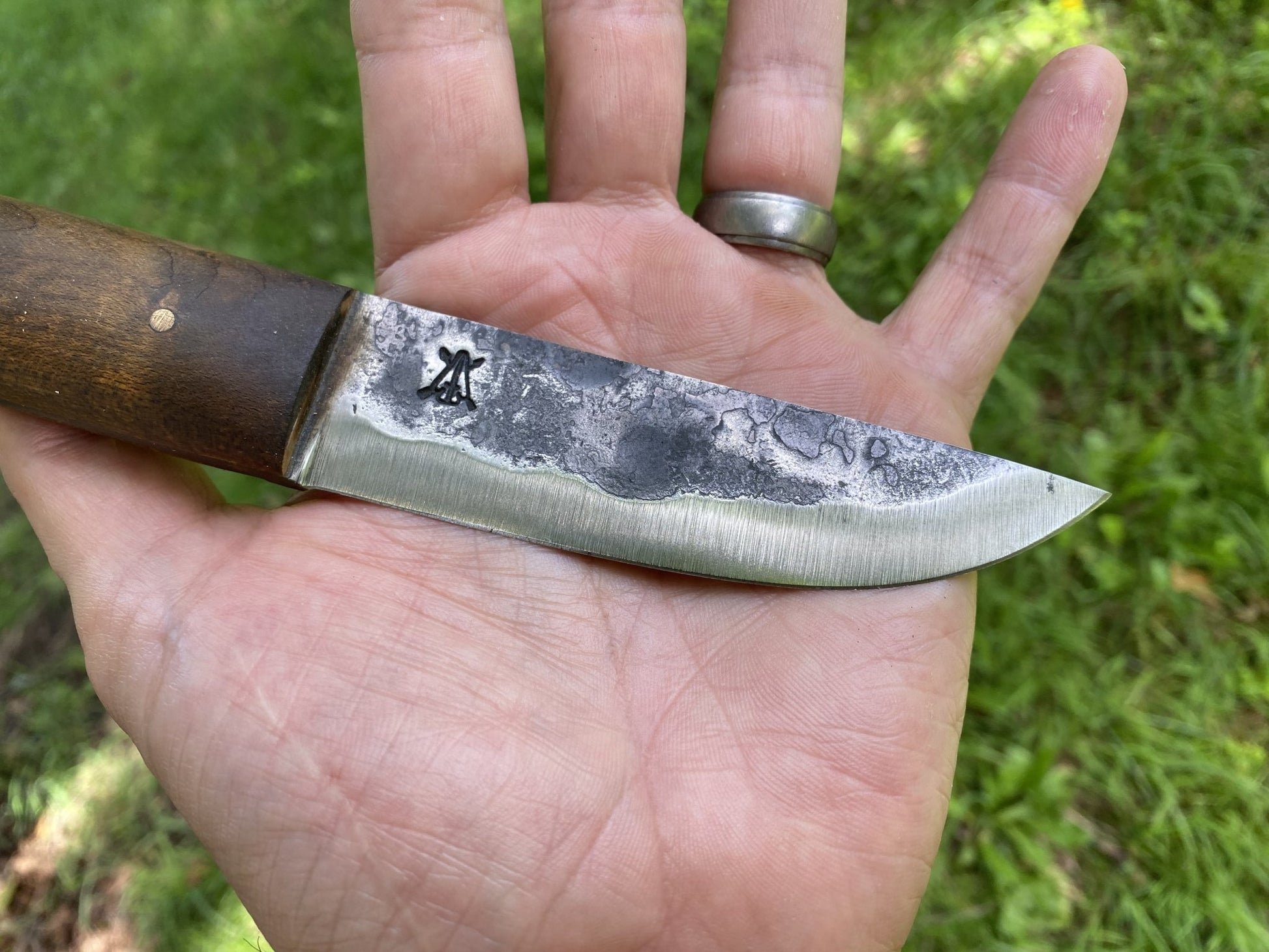 gray bearded green beret gb2 puukko full tang high carbon steel survival and bushcraft knife hand comparison view