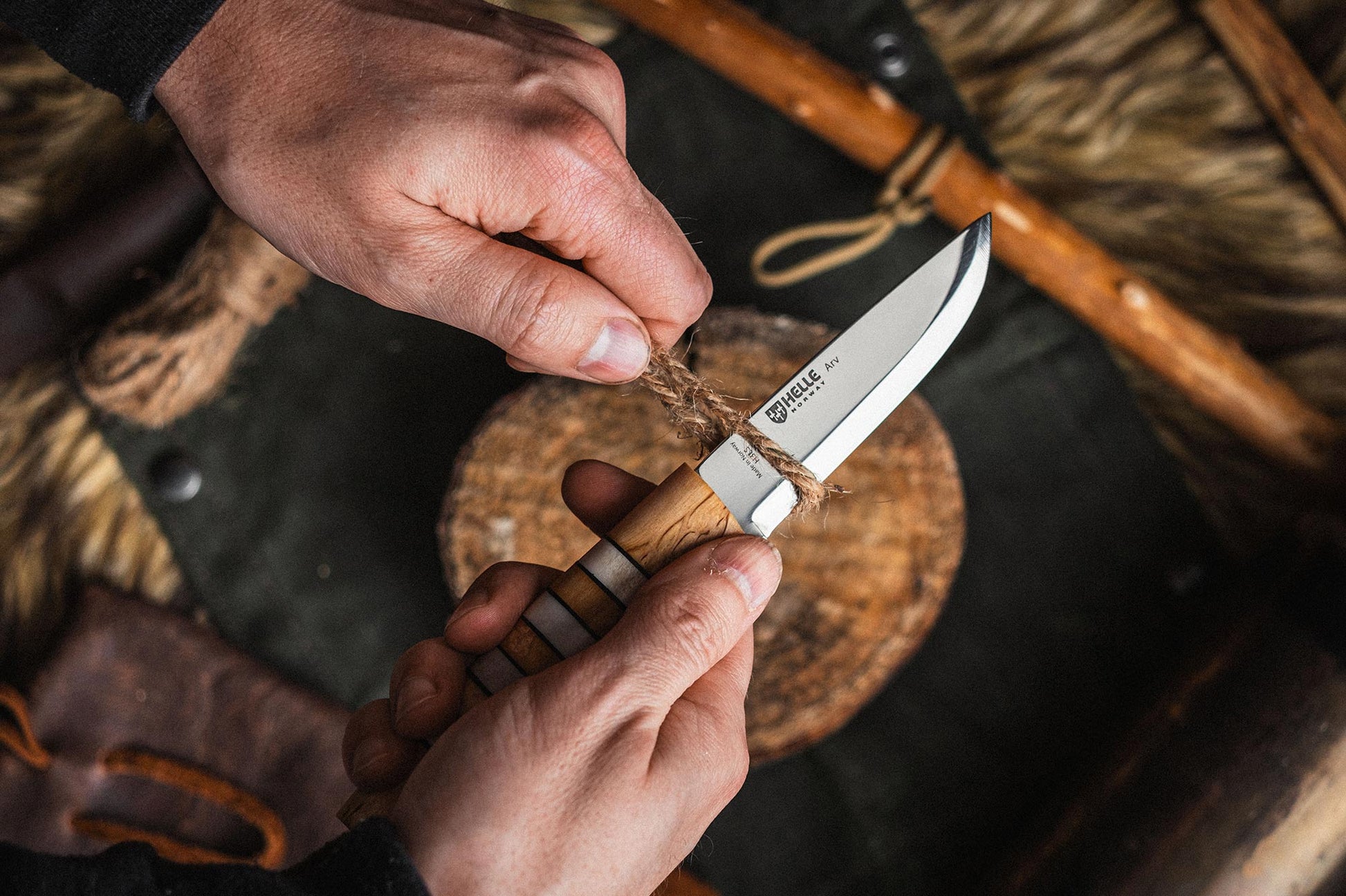 Helle Arv Fixed Blade Knife in use cutting cordage