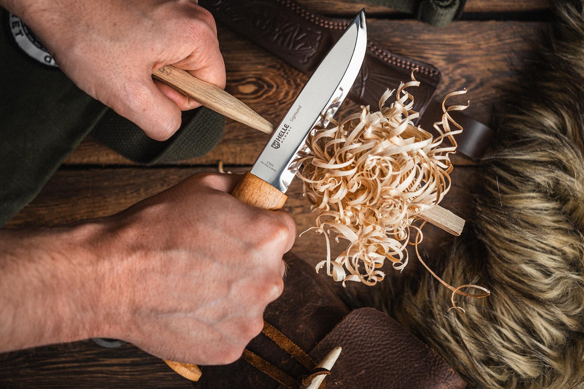 Helle Sigmund Fixed Blade Knife in use featherstick