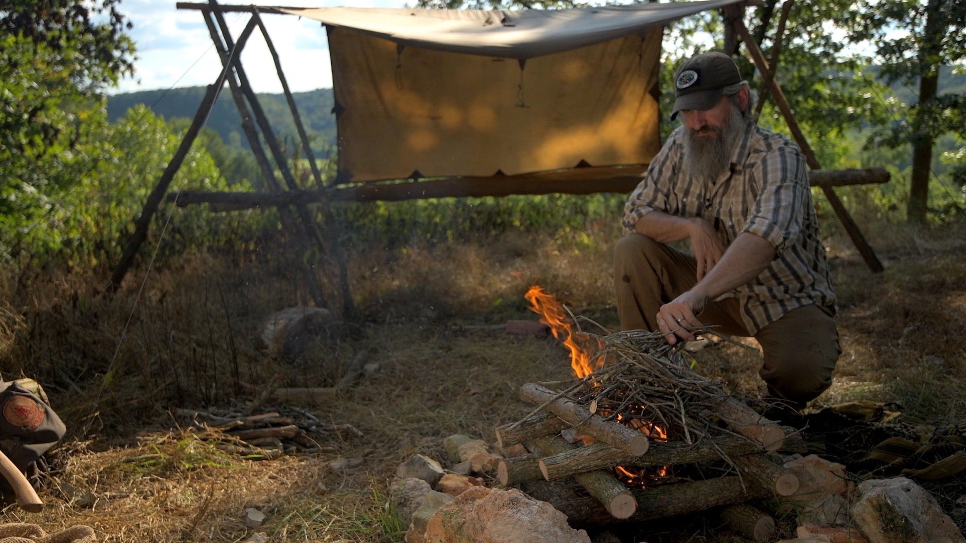 Into the Ozarks: Bushcraft Film with Joshua Enyart – Bushcraft Skills (Streaming, USB, and DVD) Tarp Shelter and Log Cabin Fire