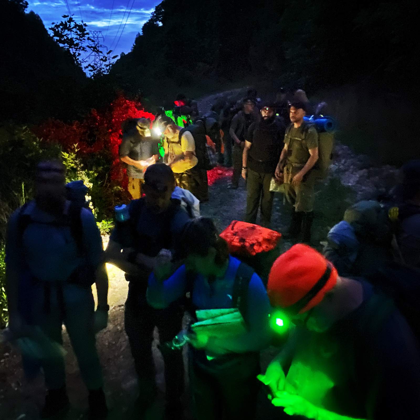 Master Navigator Land Navigation Course — Gray Bearded Green Beret Survival School Students Night Navigation with Headlamps and Glow Sticks