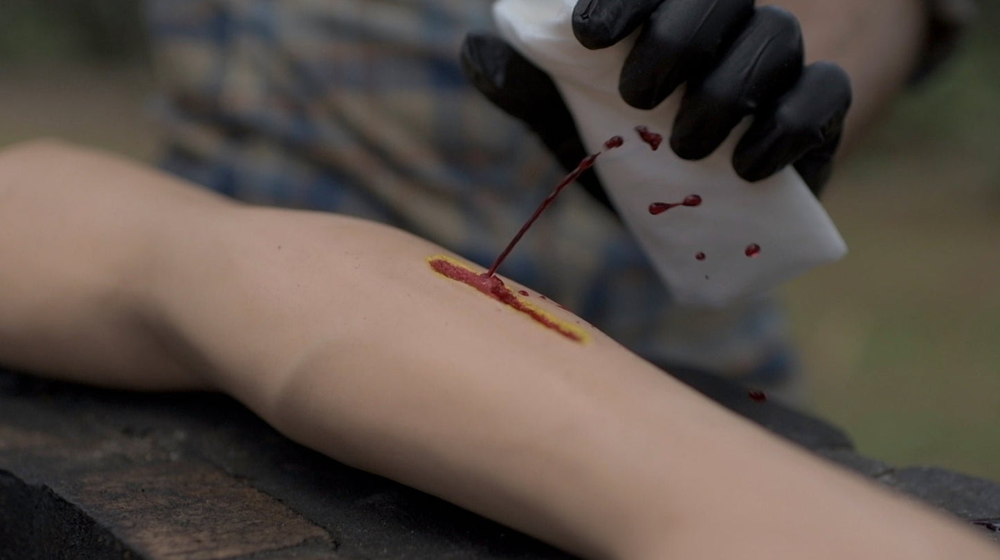 Wilderness Medical Training Film with Joshua Enyart – First Aid Skills for Remote Emergencies (Streaming and USB) Simulated Arterial Bleed on Training Arm