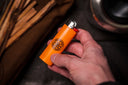 GB2 high visibility orange custom logo bic lighter in hand