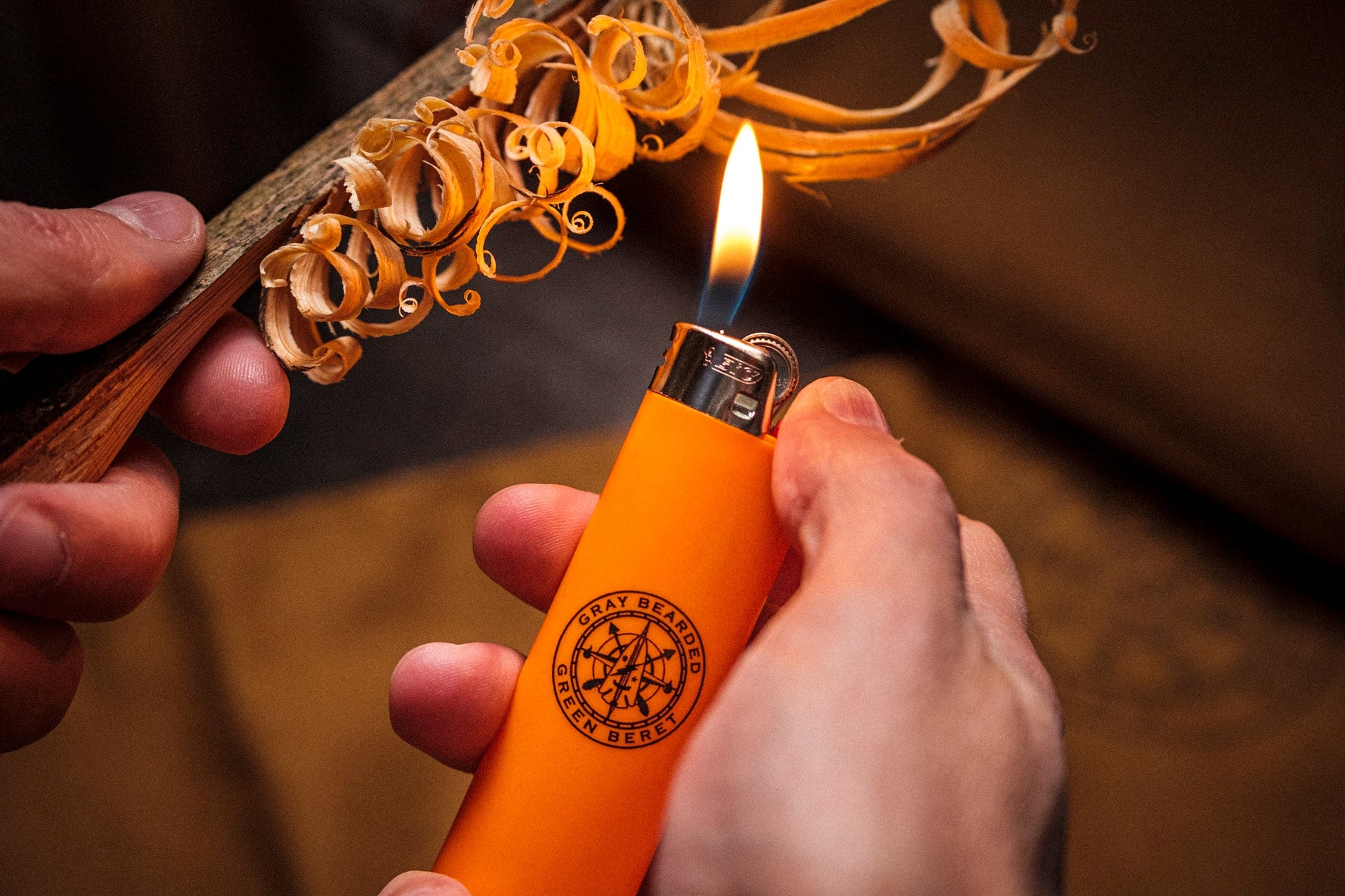 GB2 high visibility orange custom logo bic lighter in use