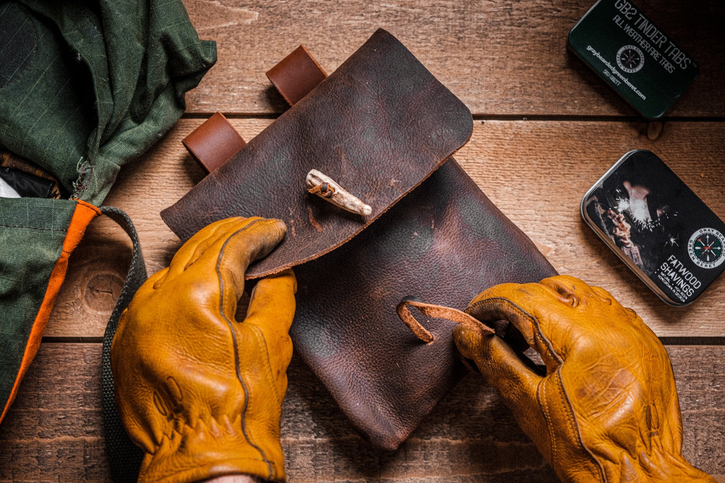 Hand-Made Leather Belt Pouch with Antler Fastener In Hand