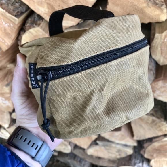 Stainless Steel Bush Pot: The Kessel Bush Pot with Waxed Canvas Pouch in hand