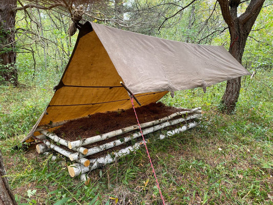 Tentsmiths Oilskin Tarp with Reinforced Center Loop Wind Shed Tarp Shelter over Birch Leaf Crib